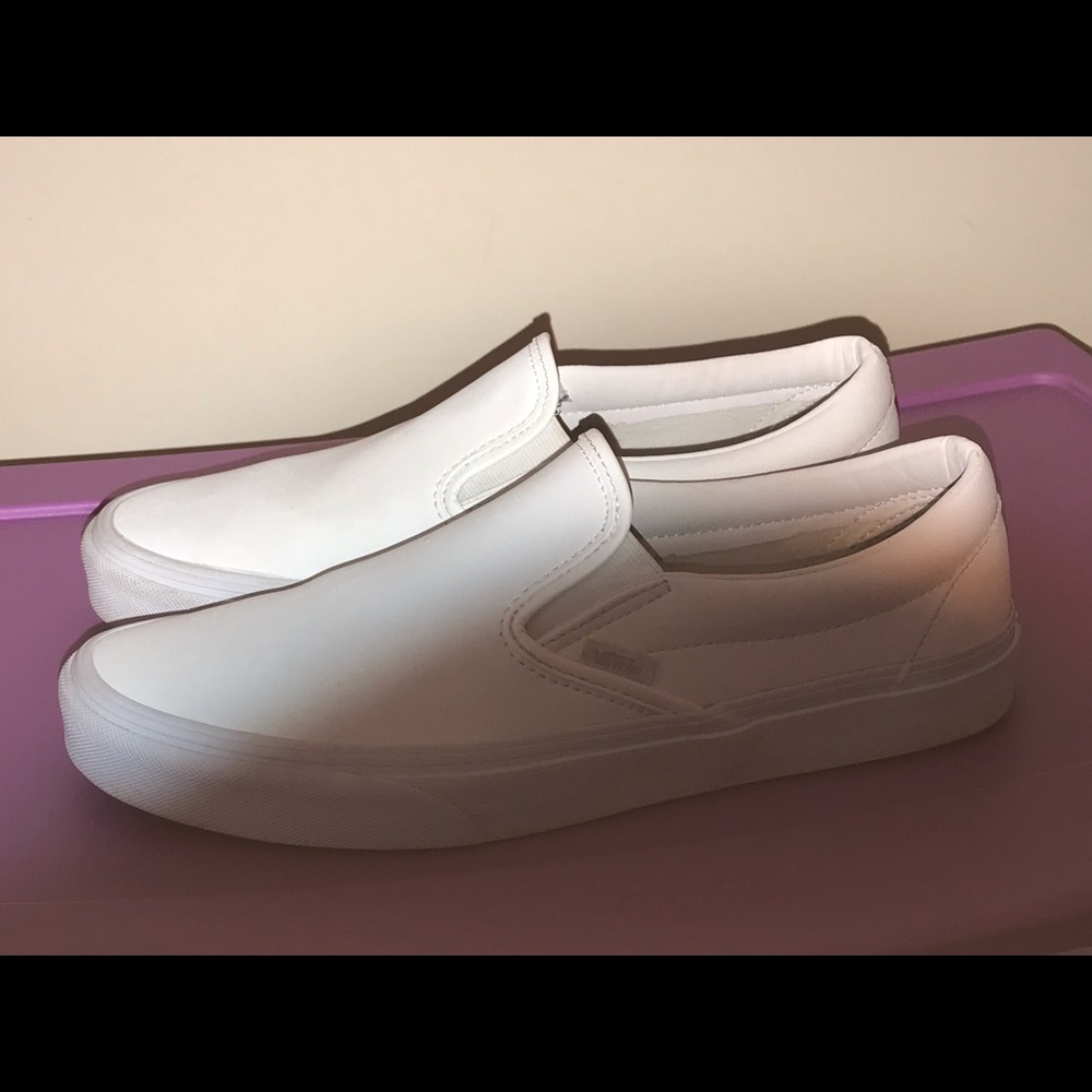 All white leather vans.
